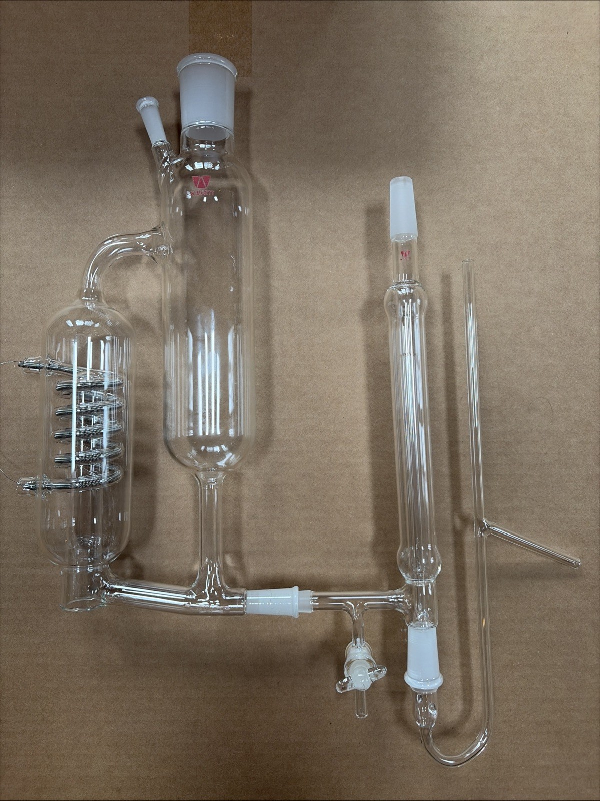 Glass Distillation Reboiler and Automatic Level Control. Continuous Operation