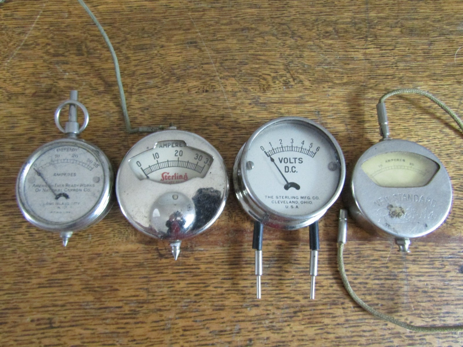 4 vintage Ampers and volt meter, 2 Sterling, American Every Ready, Readrite.